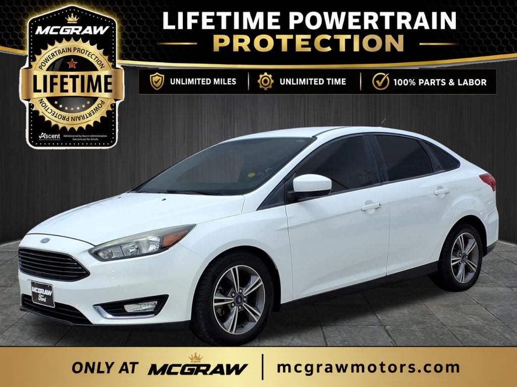 2018 Ford Focus SE in Oxford White — front three-quarter view