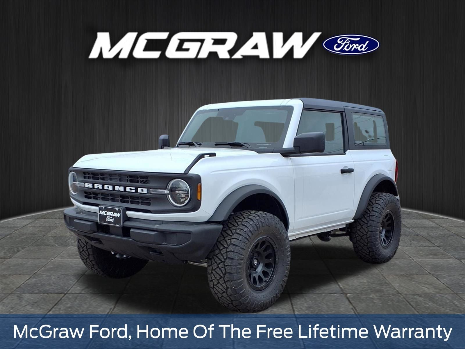 2025 Ford Bronco Base in Oxford White — front three-quarter view