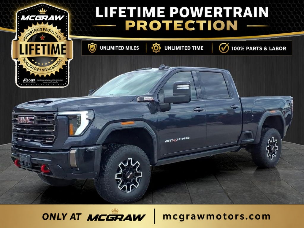 2024 GMC Sierra 2500HD AT4X in Titanium — front three-quarter view