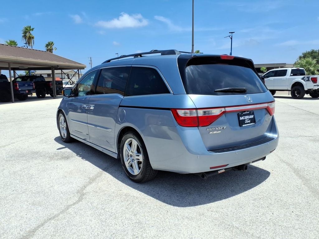 2013 Honda Odyssey — rear three-quarter view